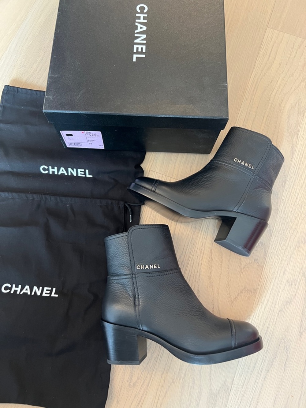 Chanel Black Leather Short Slip-On Booties with Block
Heel - Size EU 38 (US 7) - Picture 15 of 15